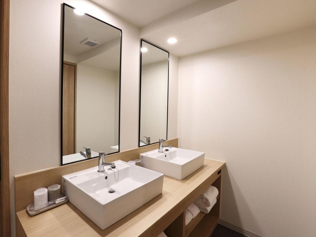 Henn Na Hotel Express Nagoya Fushimi Ekimae Bagian luar foto
